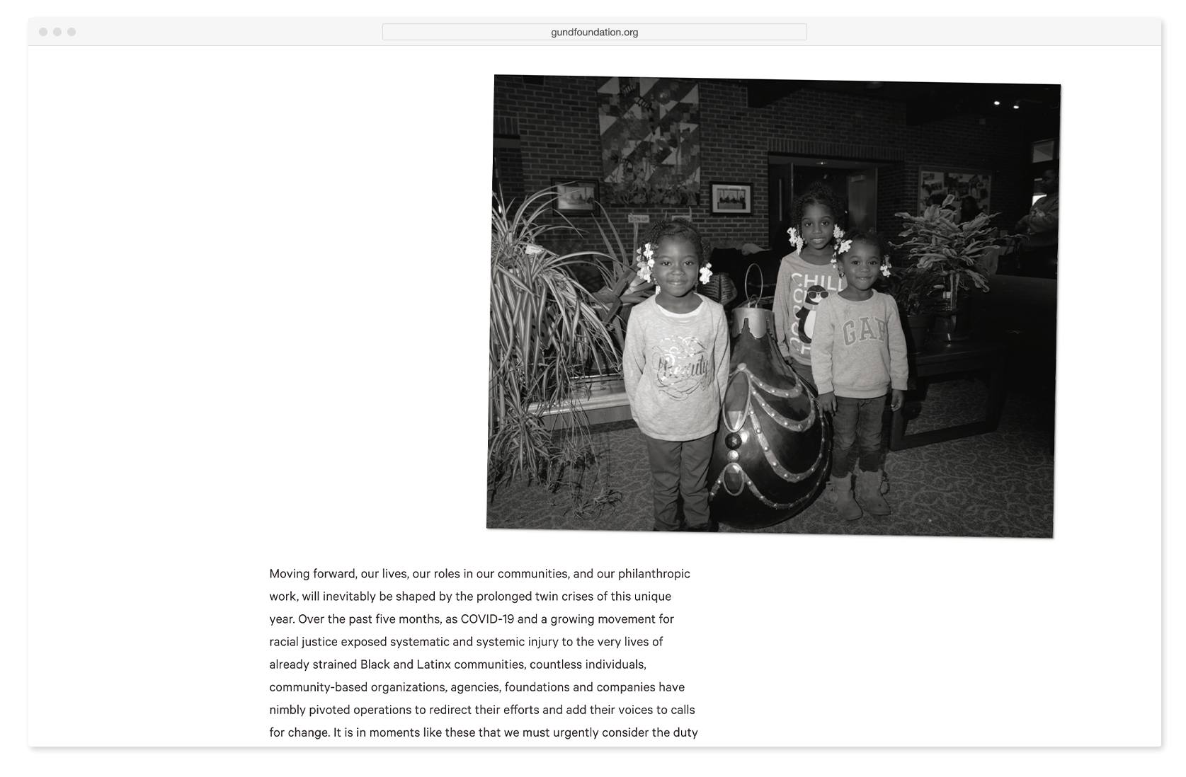 Web browser view of Gund annual website, featuring photograph of three children and paragraph from Board Chair letter