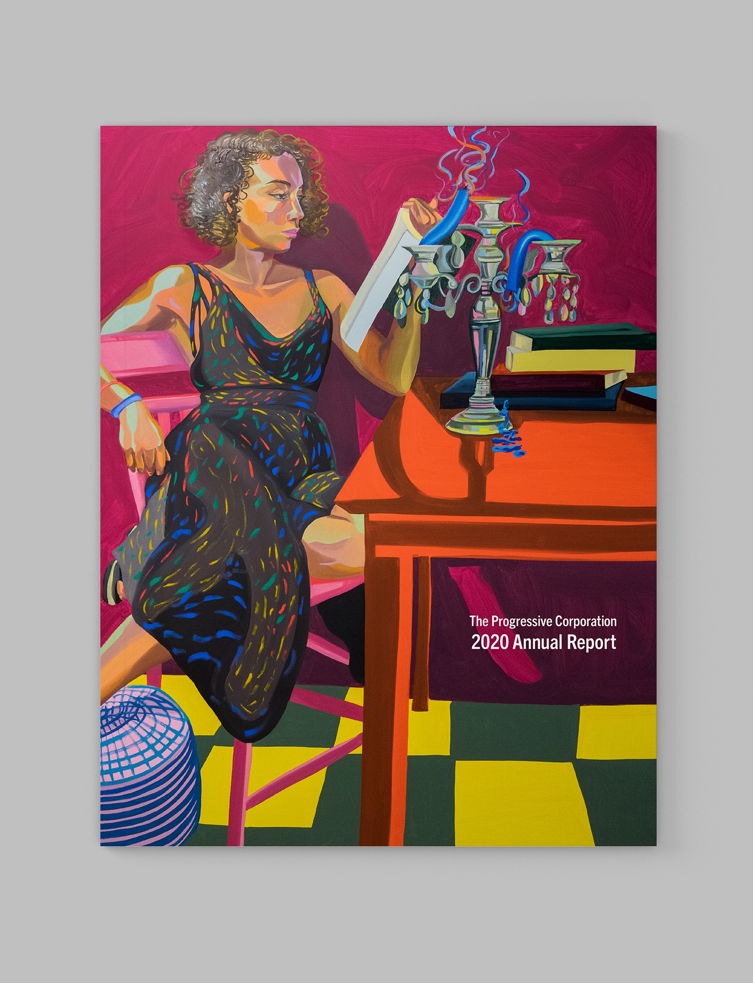 The Progressive Corporation Annual Report 2020 Cover, which features colorfully painted artwork by Aliza Nisenbaum of a woman in a dress reading at a table.